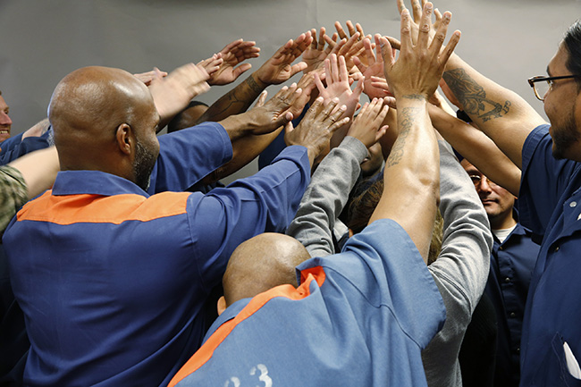 Group photograph from the Humanize the Numbers project, photographed in Michigan prisons